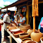 ** A bustling marketplace in Mauritius. Tourists are shown buying souvenirs and local crafts. In the background, a local artisan is working on their craft, with finished goods displayed. The overall atmosphere is vibrant and colorful, showcasing the economic contribution of tourism to local businesses. Focus on the detail of local handicrafts, like woven baskets or carved wooden items, and the interaction between tourists and local vendors.
**